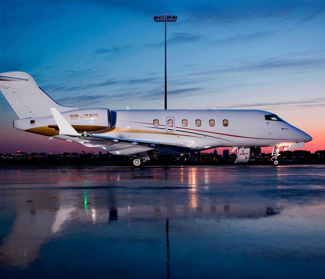Bombardier Challenger 300 private jet on runway at dusk