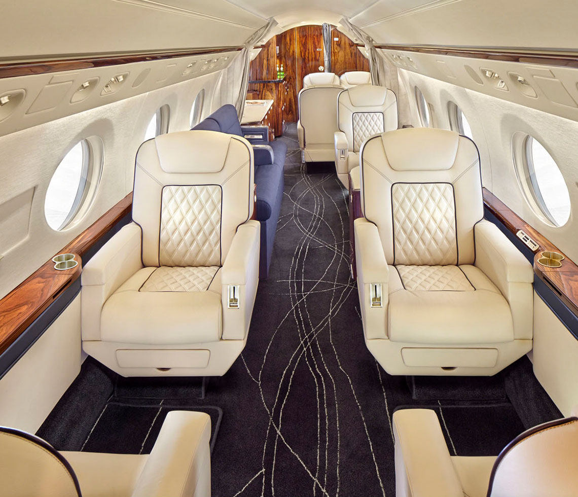 Gulfstream G550 private jet charter interior cabin