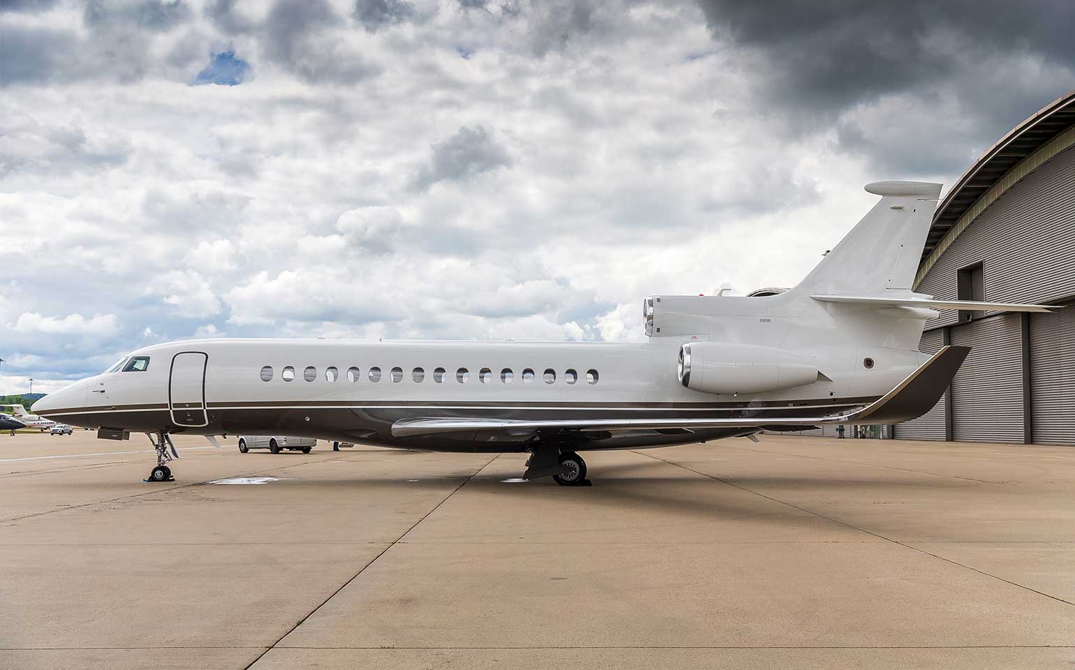 Dassault Falcon 8X private jet charter at airport hangar