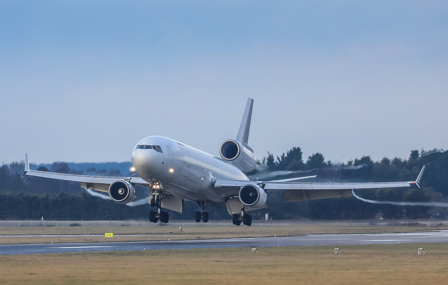 McDonnell Douglas MD11F cargo aircraft charter freight plane taking off