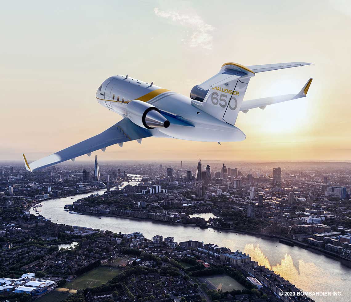 Bombardier Challenger 650 private jet flight over London at sunset