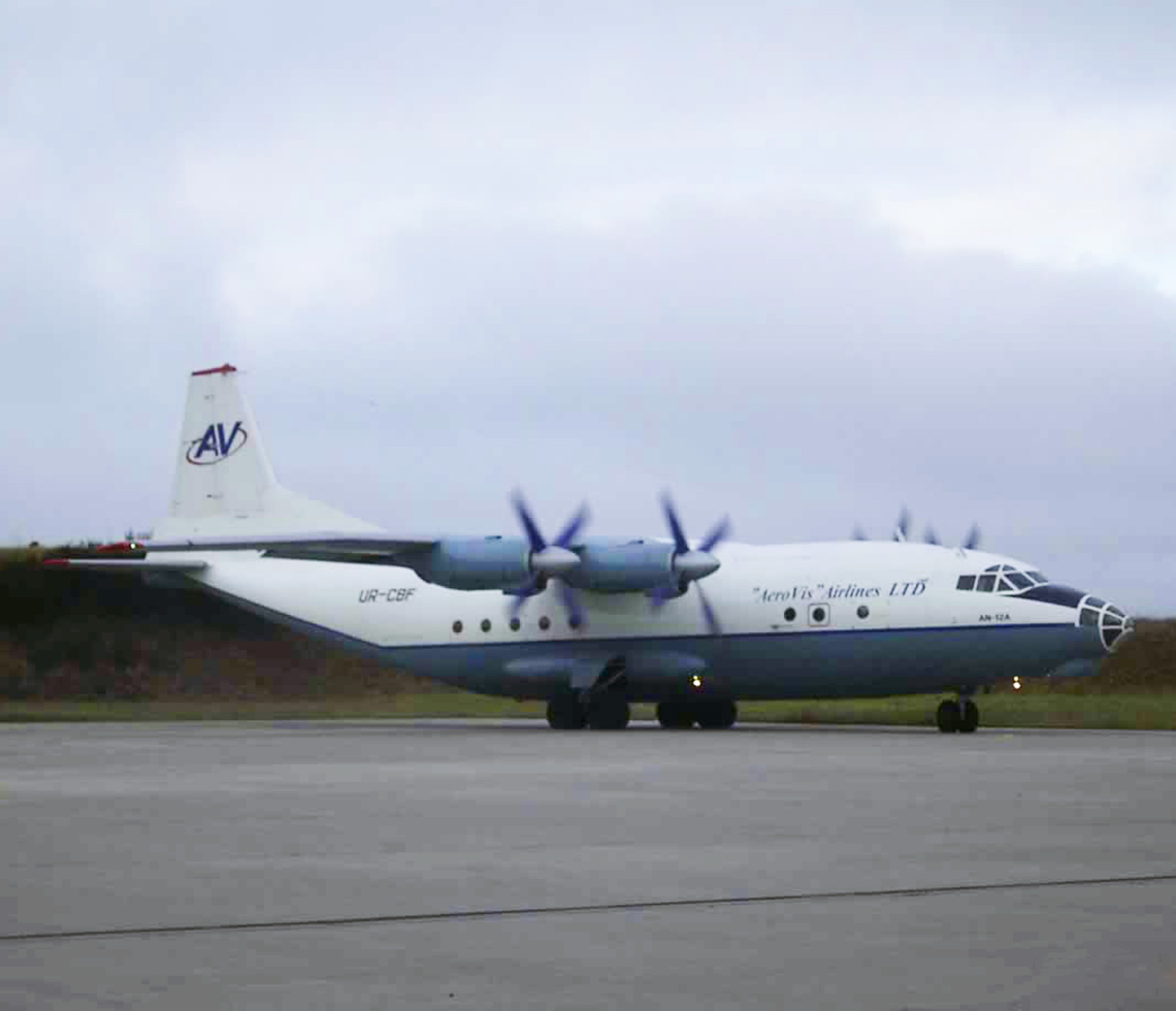 Antonov AN-12 cargo charter aircraft taking off