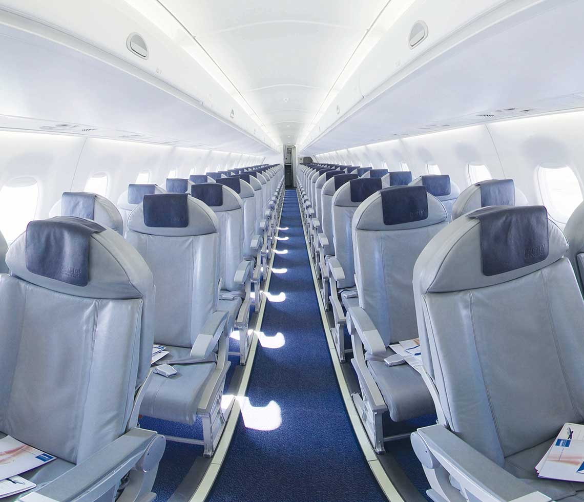 Embraer 170 private aircraft interior with grey passenger seats