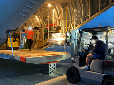 Loading urgent ship spares cargo into aircraft