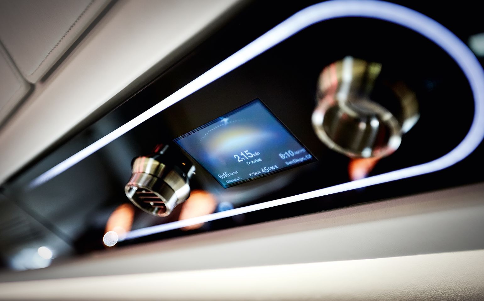 Embraer Praetor 500 private jet charter interior cabin control panel