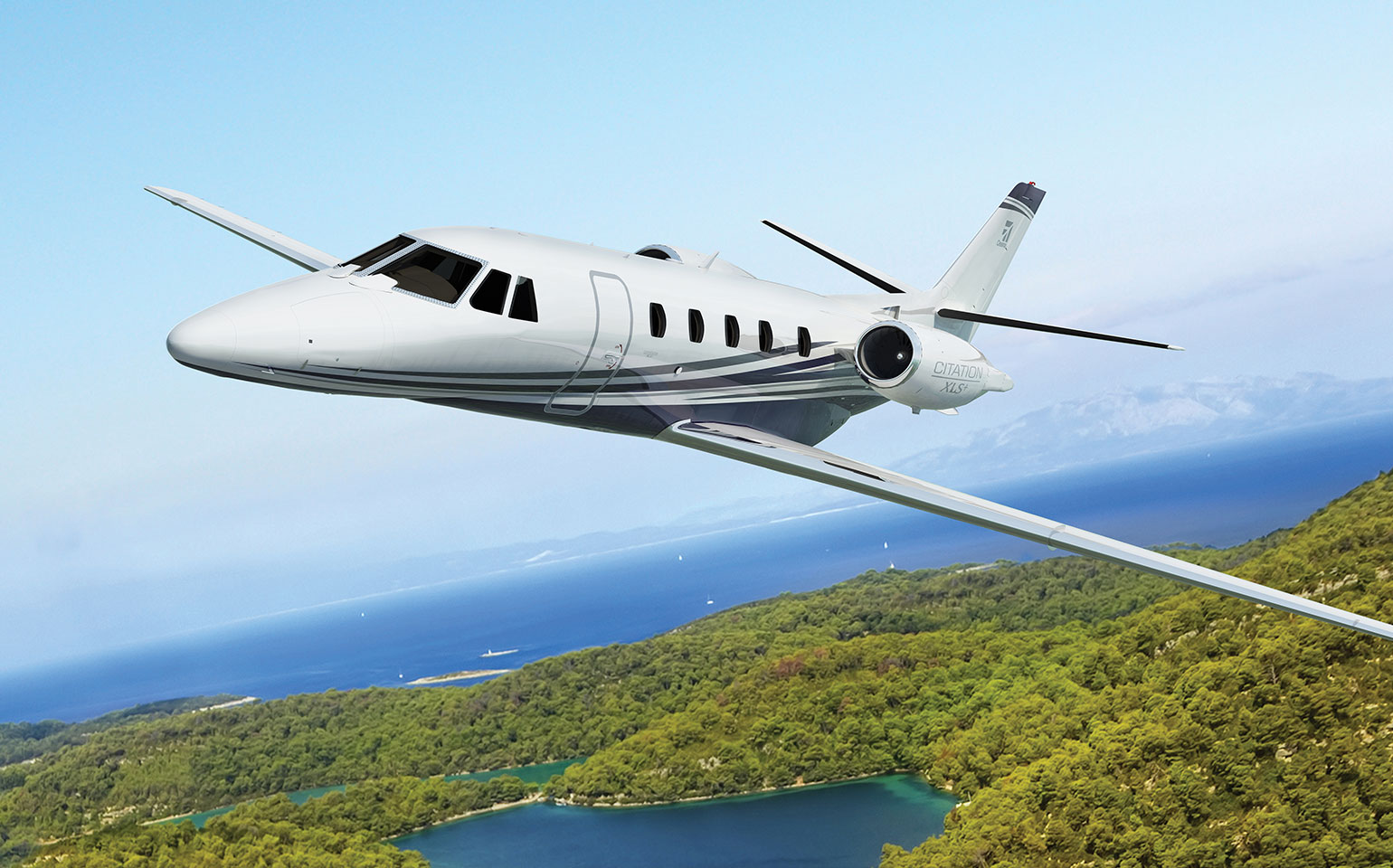 Cessna Citation XLS private jet charter flying near beach